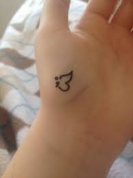 The colon represents the body of a butterfly. Semicolon With Butterfly Wings The Semicolon And Then Butterfly Project Combined So Much Tiny Butterfly Tattoo Small Butterfly Tattoo Butterfly Wrist Tattoo