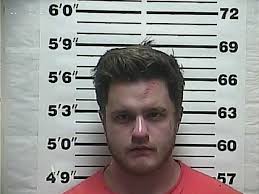 Driver charged after SUV hits house in Weakley County