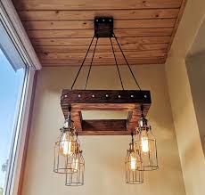 Each ceiling lamp is unique due to wood crafting. Rustic Chandelier Industrial Modern Lighting Commercial Etsy Rustic Chandelier Industrial Modern Lighting Wooden Pendant Lighting