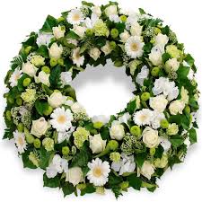 | / find artificial white wedding flowers, like this beautiful real touch anemone in white with a black center. Lyon Funeral Arrangement Souvenir