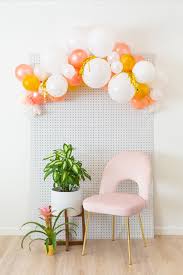 Creating a balloon arch using the balloon decorating strip. How To Make A Balloon Arch