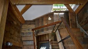 A horizontal cedar railing is framed by modern matte black rails, lending a modern appeal that creates privacy on this deck. Top 10 Hottest Interior Railing Design Trends Agsstainless Com