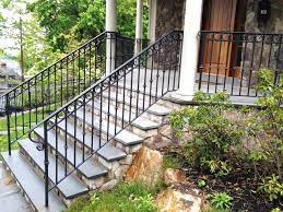 Small brick porch with wrought iron railing. Decorative Wrought Iron Porch Railing Wrought Iron Porch Railings Outdoor Stair Railing Porch Railing