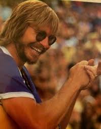 Charlie rich sets fire to john denver's cma slip watch defending entertainer of the year winner go off script at the 1975 cma awards John Denver John Denver Pictures John Denver Singer