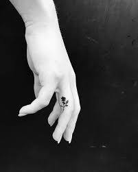 Black Rose Tattoo On The Right Side Of The Right Ring Finger Black Rose Tattoos Finger Rose Tattoo Side Finger Tattoos