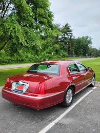 Image result for Toreador Red 1999 Town Car