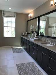 Maybe you would like to learn more about one of these? Bathroom Remodel Ideas Dark Brown Cabinets Light Countertop Light Tile Flooring Pic Taken Fr Dark Brown Cabinets Brown Cabinets Dark Cabinets Light Floor
