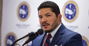 Nueces county district attorney mark gonzalez holds a vote for me sign, tuesday, nov. The Tattooed Star Of The Progressive Prosecutor Movement Braces For His First Death Penalty Trial