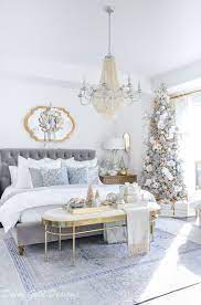I love the christmas tree in the corner. Love This Winter White Christmas Bedroom The Slender Tress Fits Beautifully In The Winter Bedroom Decor Christmas Decorations Bedroom White Christmas Bedroom