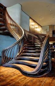 A compact design centered around a single pole, so that if you looked at it from above, it would form a perfect circle. These Stairs From A Different Dimension Https Ift Tt 2roaxkw Stair Design Architecture Stairway Design Railing Design