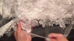 Before/after one way to lengthen a dress is to buy two of the same dresses and using the fabric of one of the dress to add it to the other dress. Hem A Lace Wedding Gown Youtube