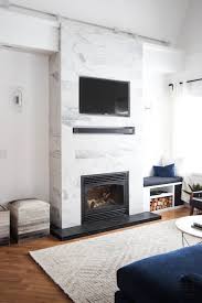 Black And White Tile Fireplace Surround White Tile And Black Hearth Living Room Reveal Slate Fireplace Fireplace Design