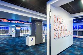 Bill heavener football training center on tuesday, locking the final steel beam that will make up the. Locker Room Design Renovation Agency Dimensional Innovations