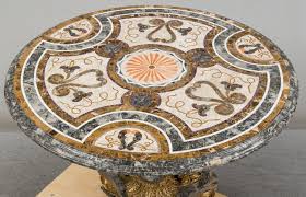 Sculpted marble amazonas dining table, giorgio bonaguro dimensions: A Modern Italian Marble Veneered And Parcel Gilt Centre Table Bukowskis