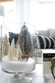 The most common silver table decor material is metal. 33 Awesome Snow Christmas Decorations Gold Christmas Decorations Christmas Coffee Table Decor Christmas Centerpieces