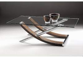Add clear glass #coffeetable with spectacular carvings in your #bedroom. Vale Furnishers Ski Coffee Table