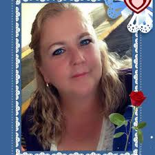 The officer may have been "visually intimidating voters," according to the  county Democratic Party chairman.