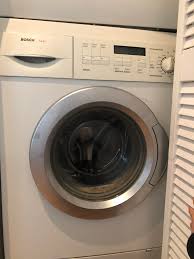 Open the door and close firmly. Can Someone Id This Bosch Axxis Compact Stacking Front Load Washer The Door Is Stuck Shut And I Can T Open It To See The Make Model Number But Repair Guy Wants Me To Give
