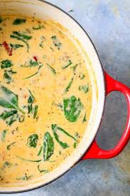 Keto Creamy Tuscan Soup Hearty Soup Bursting With Sausage Roasted Red Pepper Spinach And Garlic Flavor Tuscan Soup Creamy Spinach Soup Soup Recipes