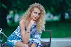A beautiful pink shade like this will suit all short haircuts for women and will look gorgeous for the spring and summer. Beautiful Model Portrait Person Curls Curly Hair Long Hair Beauty Beautiful Girl Blue Dress Summer Pxfuel
