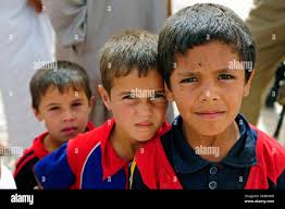 Usa soldiers children iraq hi-res stock photography and images