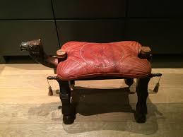 What is a saddle chair / stool? Old Vintage Leather Camel Saddle Stool Catawiki