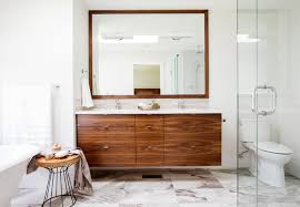 Because of their size and function, rustic bathroom vanities often take center stage. Room Of The Day Walnut Vanity Warms Up A Master Bathroom