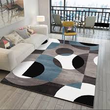 Installations in the middle of a room, called an island design, work easily with this style of kids mat. Aladin Black And White Geometric Rug Living Room Area Rugs Living Room Carpet Rugs In Living Room