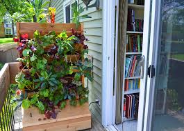 Vertical gardening produces a great deal of food in a very small space. Vertical Vegetable Growing Wall Garden Vegetable Farm