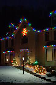 Red white and green christmas lights on house. Pin On Outdoor Lighting Perspectives