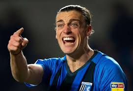 Gillingham boss Steve Lovell says referees must give striker Tom Eaves more  protection after rough tactics from Oxford