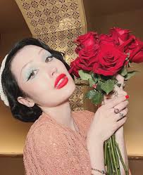 Here and there — roses and roses and roses ✨ wearing a 1934 dated knit top  and skirt.