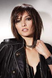This Mid Length Layered Haircut Is Neck Length At Its Longest Points With Tapered Forward Edges Medium Hair Styles Medium Length Hair Styles Long Hair Styles