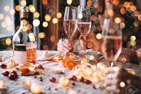 Friends Celebrating Christmas Or New Year Eve Party Table With Rose Champagne Lizenzfreie Fotos Bilder Und Stock Fotografie Image 110132967 New year's eve brings some of the biggest stars and parties to dubai. friends celebrating christmas or new year eve party table with rose champagne