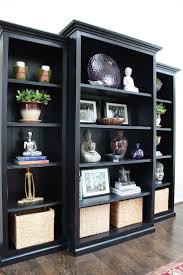 Trim Three Inexpensive Bookcases With Mouldings And Paint Them Black They Look Great Bookcase Decor Bookcase Diy Bookcase Makeover