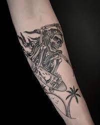 The character is shown wearing a black hooded robe, has long hair and carries a sharp scythe which he uses to cut down the human souls, and to top it all, it bears a grim expression on its face. Skateboarding Grim Reaper Tattoo By Nate Fierro Natefierro On Ig Reaper Tattoo Grim Reaper Tattoo Tattoos