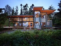 Using the clean, economical forms and materials of the classic danish sommerhus as inspiration, three gabled structures totaling 1700. Architect Nils Finne Designs A House Of Views On Hood Canal The Seattle Times