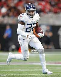 Derrick Henry Of The Tennessee Titans Rushes In The First Half Of An Tennessee Titans Football Titans Football Nfl Football Teams