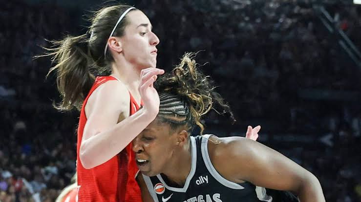 Caitlin Clark left hurting after Chelsea Gray elbow incident in Fever-Aces  clash | Watch