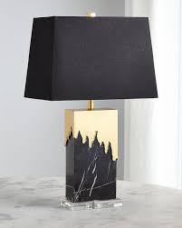 Large circular finials top each lamp. Drip Brass Black Marble Table Lamp
