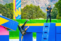 Image result for what was the game show where people went through an obstacle course above water