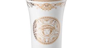 Versace is a brand synonymous with grandeur and elegance, and we present to you the privilege of being the proud possessor of a range of home ware items that will elevate your household with sophistication. Versace Medusa Gala Vase 26 Cm Rosenthal Porcelain Online Shop