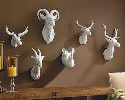 The paper animal head trophies come in flat packages. Williams Sonoma Home Ceramic Animal Heads Copycatchic Animal Head Wall Art Ceramic Animals Faux Animal Head