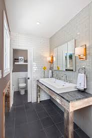 Rustic Bathroom With Double Vessel Sink Subway Tile Walls Separate Toilet Room Square Tile Fl Rustic Modern Bathroom Rustic Bathroom Designs Rustic Bathroom