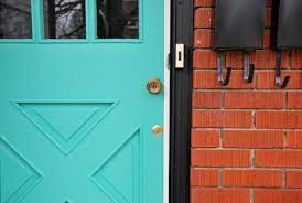 You can pair the light grey paint of the wall with white color for the trim, doors, and windows for perfection. A Last Look At The Bungalow Final Home Tour Red Brick House Turquoise Front Door Turquoise Door