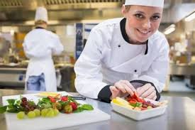 Smiling Chef Putting A Strawberry In The Fruit Bowl In The Kitchen Food Hacks Healthy Online Cooking Cookery