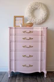 Against that backdrop, rustic farmhouse bedroom furniture, including a distressed bench, stand out. Pink And Gold French Provincial Tall Dresser Pink Furniture French Provincial Dresser Makeover French Inspired Furniture