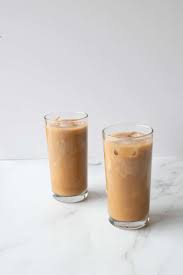 Add two tablespoons of caramel syrup to the glass and then the cold brew coffee. Iced Caramel Latte Homemade Starbucks Hint Of Healthy