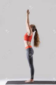 Young Attractive Woman Practicing Yoga, Standing In Tadasana ...