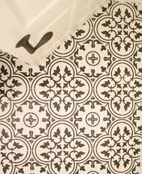 Merola Arte White Porcelain Tile From Home Depot Mimics Encaustic Cement Tile But At A Much More Affordable C Flooring White Porcelain Tile Ceramic Floor Tile